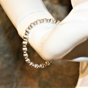 Bracelet with silver and gold tone beads